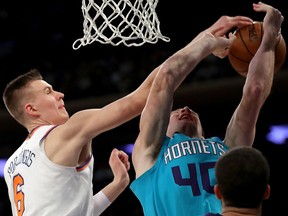 Kristaps Porzingis of the New York Knicks blocks Cody Zeller of the Charlotte Hornets at Madison Square Garden on November 7, 2017 in New York. (Abbie Parr/Getty Images)