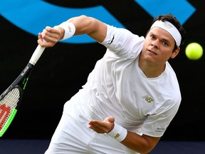 Milos Raonic serves the ball to Marton Fucsovics in their quarterfinal match at the ATP Mercedes Cup tennis tournament in Stuttgart, Germany, on June 14, 2019. (THOMAS KIENZLE / AFP)