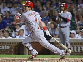 Scooter Gennett of the Cincinnati Reds hits against the Chicago Cubs at Wrigley Field on August 15, 2017 in Chicago. (Jonathan Daniel/Getty Images)