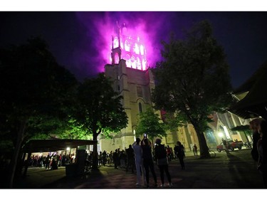 The Cathedral is lit in purple, the official color of the movement, at the start of a day-long and nationwide women's strike aimed at highlighting the country's poor record on defending the rights of women and families in Lausanne, Switzerland, June 14, 2019.
