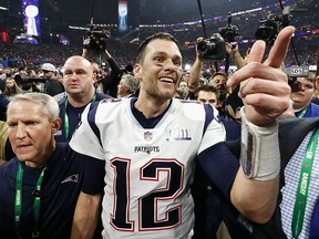 Tom Brady of the New England Patriots celebrates after the Patriots defeated the Los Angeles Rams 13-3 in Super Bowl LIII at Mercedes-Benz Stadium on February 3, 2019 in Atlanta. (Jamie Squire/Getty Images)