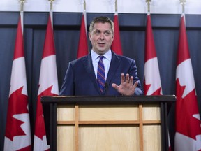 Conservative Leader Andrew Scheer reacts to Prime Minister Justin Trudeau's announcement regarding the government's decision on the Trans Mountain Expansion Project in Ottawa on Tuesday, June 18, 2019.