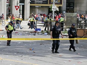 Toronto Police at the scene at Queen and Bay Sts. after a shooting during the Raptors championship parade on June 17, 2019. Veronica Henri/Toronto Sun