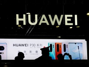 A Huawei company logo is seen at CES (Consumer Electronics Show) Asia 2019 in Shanghai, China June 11, 2019.