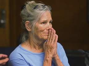 In this Sept. 6, 2017 file photo Leslie Van Houten reacts after hearing she is eligible for parole during a hearing at the California Institution for Women in Corona, Calif. (Stan Lim/Los Angeles Daily News via AP, Pool, File)