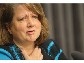 Provincial Auditor General Carol Bellringer speaks to media at the Legislative Building in Winnipeg.  Wednesday, March 19, 2014.