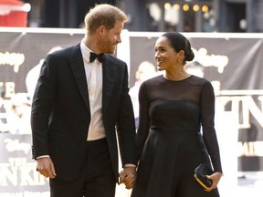 Prince Harry, Duke of Sussex and Meghan, Duchess of Sussex arrive to attend the European Premiere of Disney's "The Lion King" at Odeon Luxe Leicester Square on July 14, 2019 in London, England.