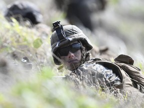 U.S Marines take up defensive positions   after completing a beach landing on July 22, 2019 in Bowen, Australia.