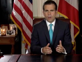 Puerto Rico Governor Ricardo Rossello speaks as he announces his resignation in San Juan, Puerto Rico, early July 25, 2019. (La Forteleza de Puerto Rico/Handout via REUTERS)