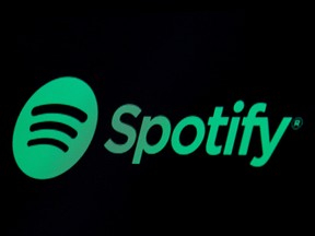 The Spotify logo is displayed on a screen on the floor of the New York Stock Exchange (NYSE) in New York City, May 3, 2018.