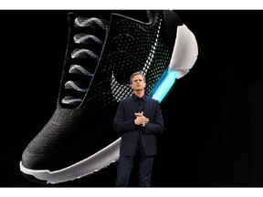 In this file photo taken on March 16, 2016, Nike president and CEO Mark Parker reveals their latest innovative sports products during an event in New York.