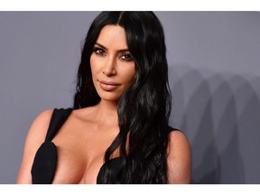 In this file photo taken on February 6, 2019 US media personality Kim Kardashian West arrives to attend the amfAR Gala New York at Cipriani Wall Street in New York City.