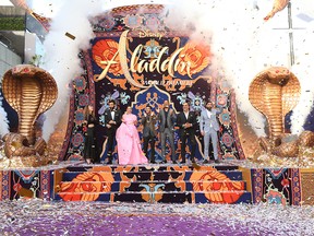 (L-R) Actors Nasim Pedrad, Marwan Kenzari, Naomi Scott, Mena Massoud, Will Smith, Navid Negahban and Numan Acar attend the World Premiere of Disney's "Aladdin" at the El Capitan Theater in Hollywood, Calif., on May 21, 2019.