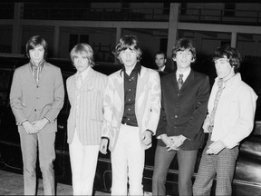 In this July 19, 1966 file photo, the Rolling Stones are pictured backstage before their concert at the Forum in Vancouver. From left to right: Charlie Watts, Brian Jones, Mick Jagger, Keith Richards and Bill Wyman. (George Diack/Vancouver Sun file photo)