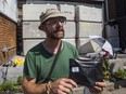 Medical marijuana user Kevin Busch stops by the CAFE dispensary's sidewalk sale on Harbord St. in Toronto, Ont. on Saturday, July 20, 2019.