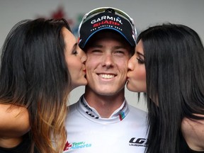 Australia rider Rohan Dennis got a couple of kisses as he claimed the gold jersey as well as picking up the white Best Young Rider jersey at the end of the fifth and final stage of the Tour of Alberta from Okotoks to Calgary on September 8, 2013.