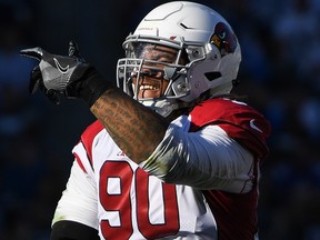 Defensive tackle Robert Nkemdiche #90 of the Arizona Cardinals celebrates his sack of quarterback Philip Rivers of the Los Angeles Chargers in the second quarter at StubHub Center on Nov. 25, 2018 in Carson, Calif..