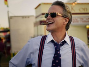 Cary Elwes, who plays Mayor Kline, smokes a cigar in Stranger Things. (Netflix)