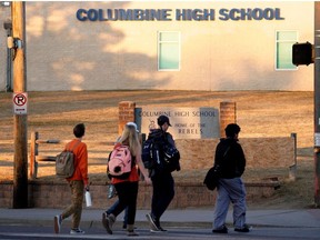 Students arrive for class at Columbine High School before participating in a National School Walkout to honor the 17 students and staff members killed at Marjory Stoneman Douglas High School in Parkland, Florida, in Littleton, Colorado, U.S., March 14, 2018.