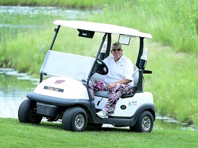 John Daly pulls up to the 17th green during the first round on the American Family Insurance Championship at University Ridge Golf Course on June 21, 2019 in Madison, Wisconsin. (Steve Dykes/Getty Images)
