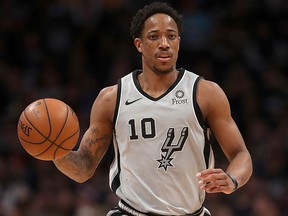 Demar DeRozan of the San Antonio Spurs brings the ball down the court against the Denver Nuggets at the Pepsi Center on April 13, 2019 in Denver. (Matthew Stockman/Getty Images)