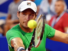 Serbia's Dusan Lajovic hits a return to Hungary's Attila Balazs during the Umag 2019 ATP tennis final match on July 21, 2019.