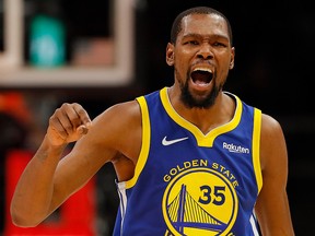 Kevin Durant of the Golden State Warriors reacts against the Atlanta Hawks at State Farm Arena on December 3, 2018 in Atlanta. (Photo by Kevin C. Cox/Getty Images)