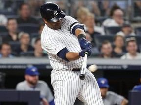 Yankees batter Edwin Encarnacion drives in three runs with a double during fifth inning MLB action against the Blue Jays at Yankee Stadium in New York City on Friday, July 12, 2019.