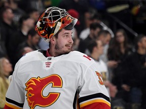 David Rittich #33 of the Calgary Flames looks across the ice after the Flames and the Vegas Golden Knights fought in the second period of their game at T-Mobile Arena on March 6, 2019 in Las Vegas, Nevada. The Golden Knights defeated the Flames 2-1.