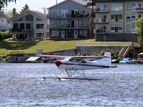 A float plane cruises in the bay off the harbourfront on Saturday, June 10.