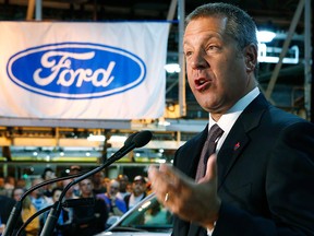 In this Sept. 19, 2013 file photo, Ford president Joe Hinrichs speaks at the plant in Oakville, Ont.