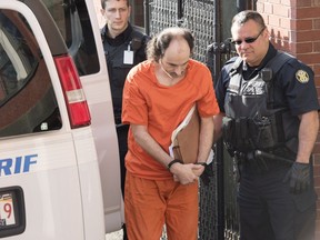 Matthew Vincent Raymond arrives at provincial court in Fredericton on Friday, July 26, 2019.