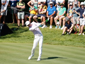 Dylan Frittelli hits his tee shot on the 18th hole during the final round of the John Deere Classic golf tournament at TPC Deere Run.