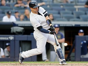 New York Yankees catcher Gary Sanchez (24) hits against the Tampa Bay Rays at Yankee Stadium. (Brad Penner-USA TODAY Sports)