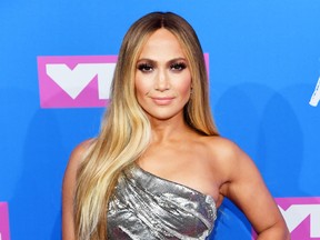 Jennifer Lopez honours gay student, Nat Werth, who was banned to give a graduation speech about being gay in a Lutheran school. Nicholas Hunt/Getty Images for MTV