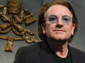 Frontman of the Irish band U2 Paul David Hewson, known by his stage name Bono, gives a press conference after a meeting with Pope Francis at Vatican on Sept. 19, 2018. (TIZIANA FABI/AFP/Getty Images)