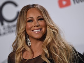 Mariah Carey poses in the press room at the 2018 American Music Awards on October 9, 2018, in Los Angeles, California. VALERIE MACON/AFP/Getty Images