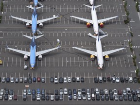 Boeing 737 MAX airplanes are stored on employee parking lots near Boeing Field, on June 27, 2019 in Seattle, Wash.