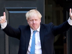 Newly elected Conservative party leader Boris Johnson poses outside the Conservative Leadership Headquarters on July 23, 2019 in London, England. After a month of hustings, campaigning and televised debates the members of the UK's Conservative and Unionist Party have voted for Boris Johnson to be their new leader and the country's next Prime Minister, replacing Theresa May.