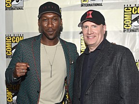 Mahershala Ali and President of Marvel Studios Kevin Feige at the San Diego Comic-Con International 2019 Marvel Studios Panel in Hall H on July 20, 2019 in San Diego, California.