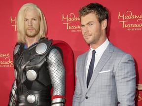 Actor Chris Hemsworth poses with his Madame Tussauds Hollywood figure at the "Avengers: Age of Ultron" premiere at Dolby Theatre on April 13, 2015 in Hollywood, California.  Chelsea Lauren/Getty Images for Madame Tussauds Hollywood