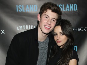 Shawn Mendes (L) and Camila Cabello attend the Island Records 2015 Holiday Party on December 11, 2015 in New York City. Monica Schipper/Getty Images for Island Records