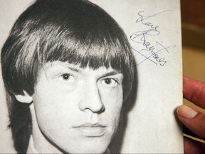 A picture from a magazine signed by Rolling Stones' guitarist Brian Jones is displayed 30 May 2007 before an auction 04 June 2007 at Bonhams and Butterfields in Los Angeles. GABRIEL BOUYS/AFP/Getty Images