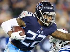 Derrick Henry of the Tennessee Titans runs with the ball against the Indianapolis Colts at Nissan Stadium on Dec. 30, 2018 in Nashville, Tenn.