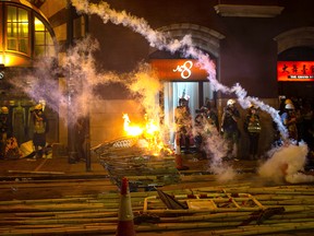 A burning cart is seen during a demonstration in the area of Sheung Wan on July 28, 2019 in Hong Kong, China.