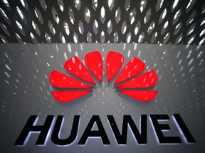 A Huawei company logo is pictured at the Shenzhen International Airport in Shenzhen, Guangdong province, China July 22, 2019.