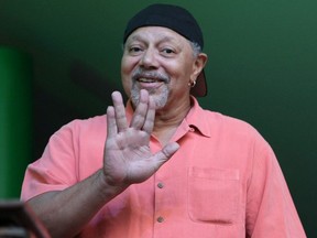 Art Neville, of the Neville Brothers, hams it up, as he comes on stage during a performance at the Ottawa International Jazz Festival, on Friday June 29, 2007, in Ottawa.