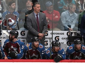 Colorado Avalanche coach Jared Bednar watches as his team plays the San Jose Sharks during the Stanley Cup playoffs at the Pepsi Center on May 6, 2019 in Denver. (Matthew Stockman/Getty Images)