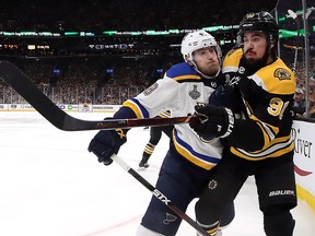 Ivan Barbashev of the St. Louis Blues checks Marcus Johansson of the Boston Bruins during Game 7 of the Stanley Cup Final at TD Garden on June 12, 2019 in Boston. (Bruce Bennett/Getty Images)