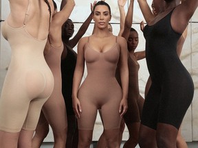 An undated image obtained on social media on June 27, 2019 shows models including Kim Kardashian dressed in bodysuits from her new clothing line, originally called Kimono in an undisclosed location.